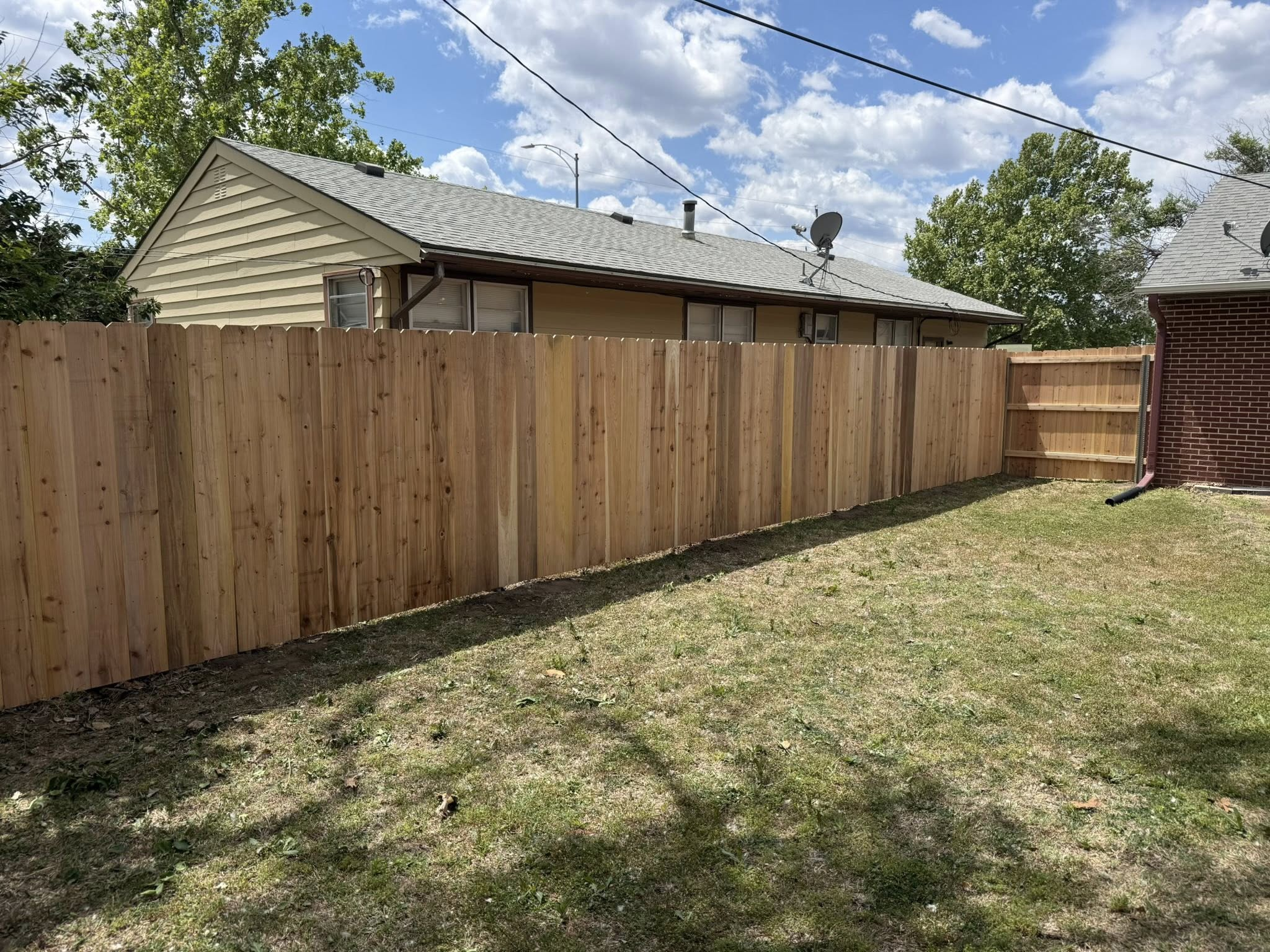 Cedar privacy fence with gate