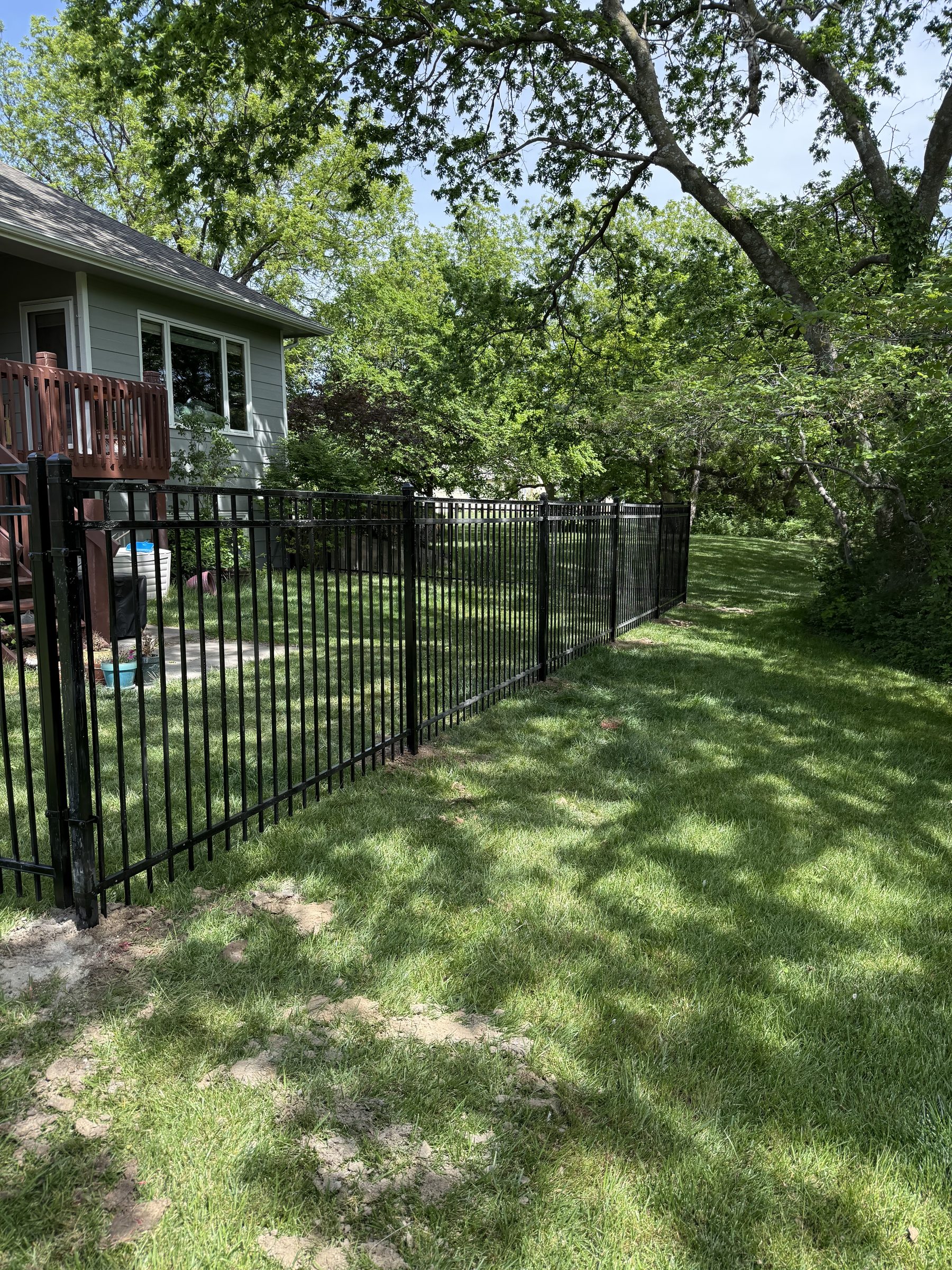 Cedar fence with wooden gate installation