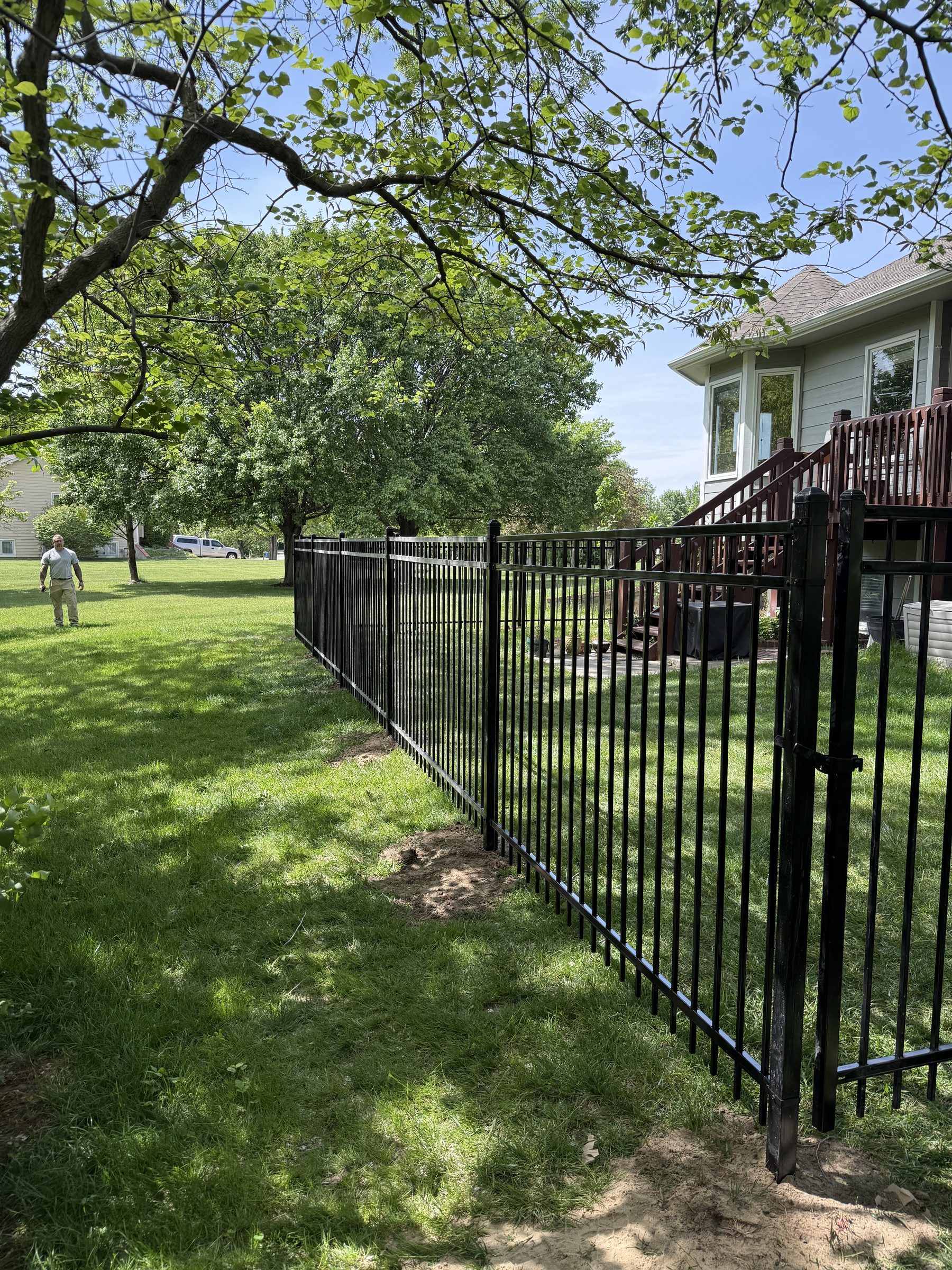New cedar fence along side of home